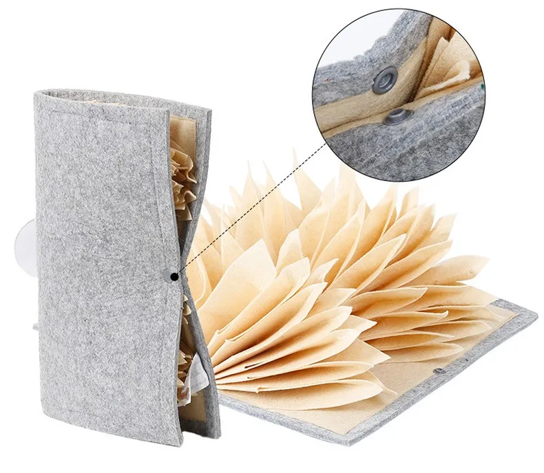 Accordion snuffle mat folding flat with snap buttons for storage