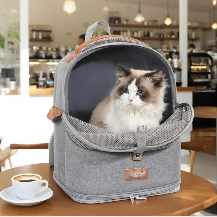 Cat sitting inside the grey foldable mesh pet backpack