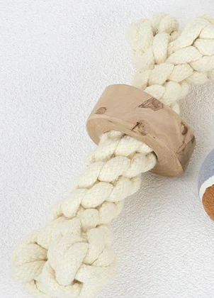 Natural Cotton Rope Dog Toy - undyed cotton rope and natural wood flat lay
