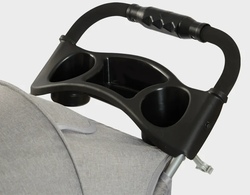 Close-up of the stroller handlebar with twin cup holders