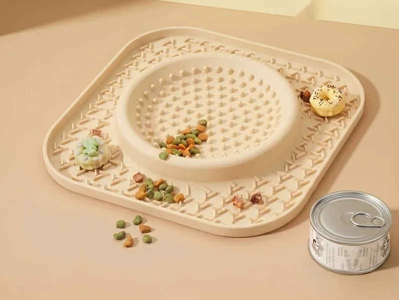 Beige silicone lick mat with treats on its textured surface